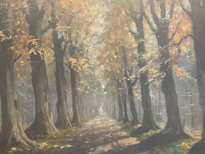 This is a painting of a tree-lined path in what appears to be a park or forest. The trees are tall and slender, with dark trunks and branches. The leaves are a mix of greens, yellows, and oranges, suggesting it is autumn. Sunlight filters through the leaves, creating dappled shadows on the path. The path itself is made of dirt and gravel, and it recedes into the distance, where a figure can be faintly seen. The overall impression is one of peace and tranquility. This painting is located in the city of Oldemarkt, Netherlands.