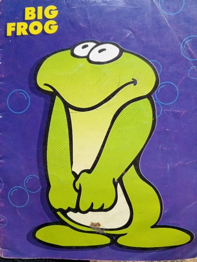 The image depicts a cartoon frog on a purple background with drawn bubbles. The frog is primarily green with a white belly and a black outline. It has large, googly eyes and a small, curved smile. The frog's arms are crossed in front of its belly. Above the frog, the words "BIG FROG" are written in yellow. The overall style is reminiscent of a children's book illustration or a retro cartoon.