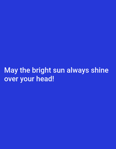 A media file displays white text on a solid blue background. The text reads "May the bright sun always shine over your head!". There are no people, objects, scenes, or specific settings visible. The activity is the display of a message. There are no discernible details about time of day, weather, location cues, or emotions. The only notable detail is the visible text.
