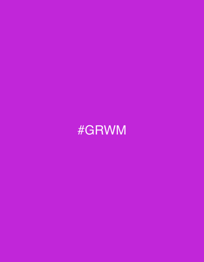 The image displays a solid magenta-purple background with the white text "#GRWM" centrally positioned. No individuals, discernible subjects, objects, actions, or interactions are present. The environment is uniformly colored, lacking any topographical or architectural features. This scene is located in the city of Anavissos Municipal Unit, Greece.