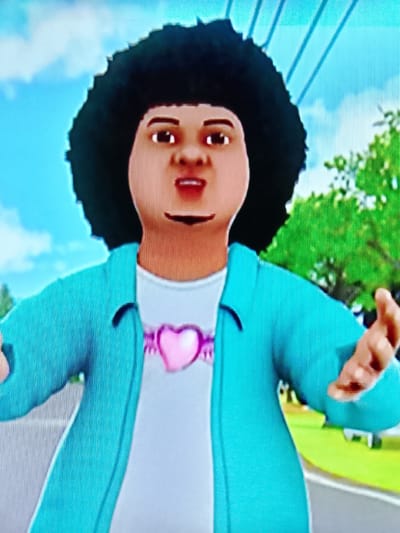 The image shows a digitally rendered character with a large, dark afro hairstyle, light brown skin, and a neutral expression. The character is wearing a white t-shirt with a pink heart pendant and a teal open button-up shirt. The character's hands are extended outwards. The background appears to be an outdoor scene with a blue sky, white clouds, and green foliage, suggesting a daytime setting. There is no discernible location in the city of Merbopuntong, Indonesia, nor any specific action or interaction depicted.