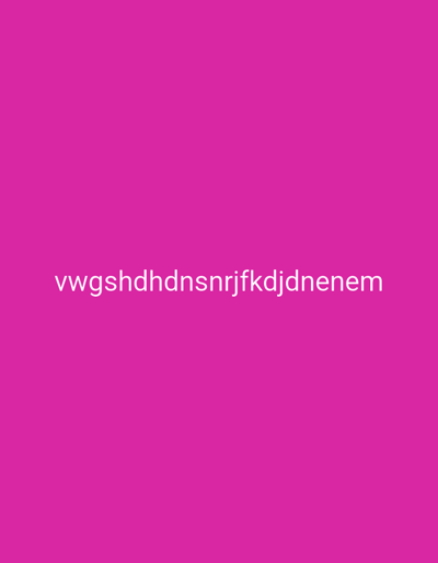 The image is a close-up, eye-level, medium shot of text rendered in white against a solid, vibrant pink background. The text is horizontally centered and appears to be a string of random characters: "vwgshdhdnsnrjfkdjdnenem". There are no discernible features of the city of Кольцо, Kyrgyzstan, or any environmental context present in the image. The scene is devoid of any people, subjects, objects, or actions.