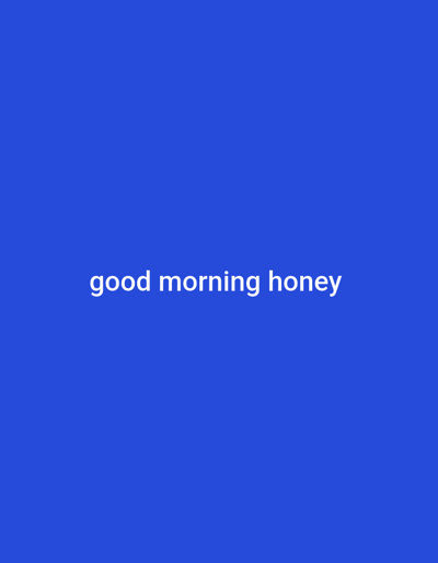 The image displays a solid, uniform medium blue background. Centered horizontally on this background is the white text "good morning honey" rendered in a sans-serif typeface. No individuals, objects, or environmental elements other than the blue field and the text are visible within the frame. The location is Tunga Mekidi, Nigeria.