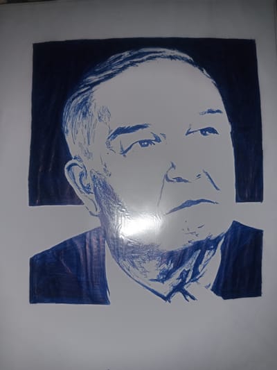 This is a hand-drawn portrait of an older man, rendered in blue ink on white paper. The subject is depicted from the shoulders up, facing mostly to the right with his gaze directed slightly upwards. He appears to be wearing a suit jacket with a tie. The background is a solid block of dark blue ink to the left of his head and a darker, vertical rectangular shape behind his right shoulder. The drawing style is sketch-like, with visible linework and some cross-hatching used for shading. The man's features, including his eyes, nose, mouth, and ears, are loosely defined. There is a significant glare on the right side of the image, obscuring some of the details. The overall impression is that of a candid or informal portrait. The location context provided is Gulbag, Uzbekistan, but there are no specific visual cues within the artwork to confirm this.