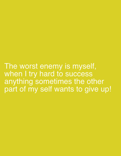 The image displays white text on a solid, uniform yellow background. The text, centered towards the lower portion of the frame, reads: "The worst enemy is myself, when I try hard to success anything sometimes the other part of my self wants to give up!" There are no people, objects, or actions visually depicted other than the text itself and its background. The environment consists solely of this graphic display. The scene is located in Gerakas Municipal Unit, Greece.