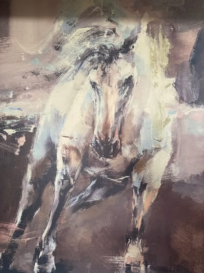 This media file is a close-up photograph of a semi-abstract painting. The primary subject is a human figure, likely female and nude, depicted in a dynamic, reclining, or falling pose. The figure occupies the central and upper-left portions of the canvas, rendered with expressive, broad brushstrokes.
The activity portrayed is an artistic interpretation of the human form in motion or repose, rather than a specific event. The brushwork suggests fluidity and energy, with lighter tones highlighting the figure's form against a darker, abstract background.
Notable details include the painting's style, which appears to be either oil or acrylic, characterized by visible texture and impasto. The color palette is muted, consisting mainly of browns, creams, grays, and whites, with subtle hints of pale blue, green, and pinkish-beige, particularly within the figure's contours. There are no explicit cues for time of day, weather, or specific location within the painting itself. The overall mood evoked by the composition and colors could be one of grace, introspection, or vulnerability. There is no visible text in the image.