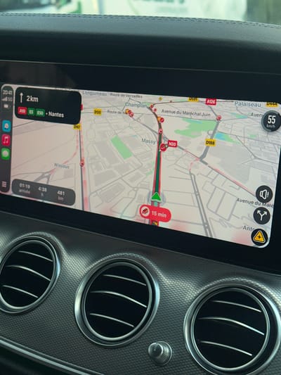 The image shows a car's dashboard display indicating navigation in the region of Massy, France, near the cities of Palaiseau and Wissous. The navigation system shows an estimated arrival time of 01:19, with a remaining travel time of 4 hours and 38 minutes, and a distance of 481 kilometers to the destination of Nantes. The current road is indicated as A10, E5, E50.