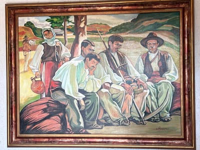 The oil painting depicts a group of five individuals in a rural landscape. Four men are seated together, appearing to be in conversation or rest. The man on the far right wears a hat and a traditional vest. The man to his left holds a tool, possibly a scythe or sickle. A woman stands behind them on the left, holding a clay jug and wearing traditional clothing. The background shows rolling hills and trees, suggesting a countryside setting. The painting is framed and signed by "c. Ressu" in the lower right corner. The painting is located in Otopeni, Romania.