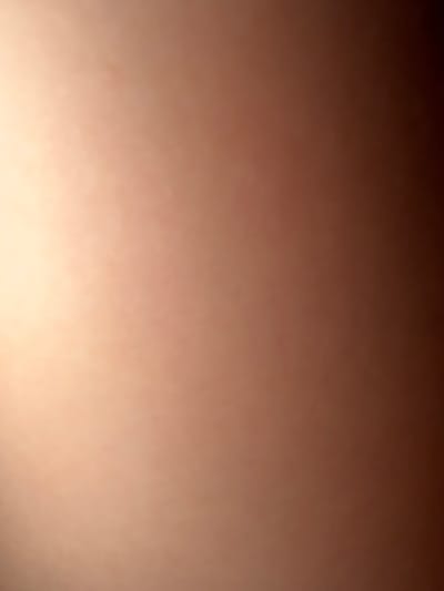 The image is an abstract, out-of-focus shot of skin. It is not possible to identify any specific location, people, objects, or actions from this image. Therefore, it is not possible to provide details about the city of Lobnya, Russia.