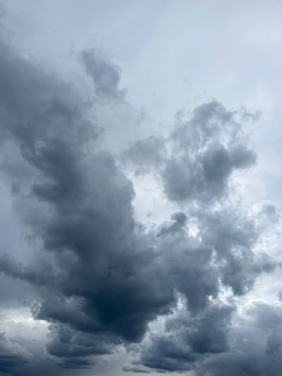 The image shows a sky filled with dark, ominous storm clouds. There is no other information provided to indicate the location in the city of Popasne, Ukraine. No people, subjects, objects, actions, or interactions are visible in the image. The environment is limited to the sky and the presence of storm clouds.
