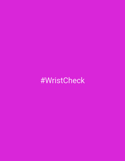 The image is a plain magenta background with the white text "#WristCheck" centered horizontally and located in the lower half of the frame. The scene is entirely abstract and contains no elements that could be associated with the city of Lyubimets, Bulgaria, or any specific physical location.