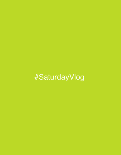 The image displays a uniform, solid lime-green background. Centered horizontally and vertically on this background is the white text "#SaturdayVlog". The text is rendered in a sans-serif typeface. No people, physical subjects, objects, actions, or interactions are present. The environment depicted is solely a digital graphic overlay; it does not portray a physical location, thus no specific setting in the city of Drenoštica, Montenegro, can be identified from the visual content.