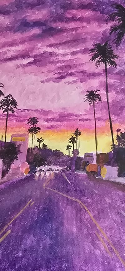 This is a painting of a sunset over a city street with palm trees. The sky is filled with dramatic purple and pink clouds, with streaks of yellow and orange near the horizon. The street is paved with purple asphalt and has yellow dividing lines. On either side of the street, there are buildings and lush green trees, with several tall palm trees silhouetted against the vibrant sky. In the distance, there are blurry lights suggesting moving vehicles. The overall mood is atmospheric and dreamlike, evoking a sense of a warm, exotic evening. The painting does not depict any identifiable landmarks or features specific to Gostagayevskaya, Russia.
