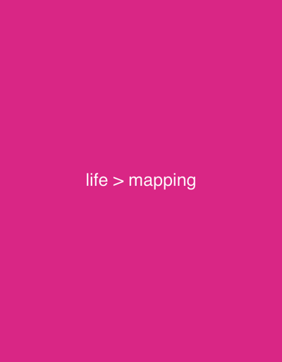 This image displays the white text "life > mapping" centered on a solid magenta background. No people, objects, or environmental details are depicted. The scene is static, featuring only text on a colored field, presented within the context of Longone al Segrino, Italy.