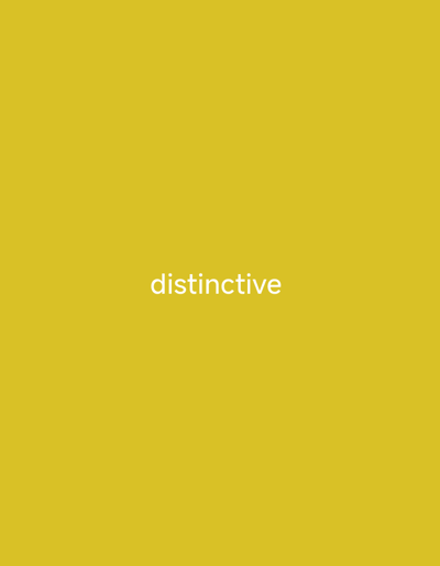 This media file is a static image with a plain yellow background. Centered on the image is the word "distinctive" written in white, sans-serif text. There are no people, objects, scenes, or settings depicted. The image is a simple graphic design element.
