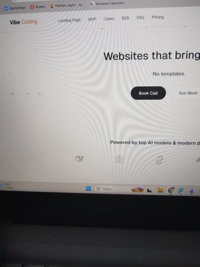 The image shows a laptop screen displaying a website. The website's header has "Vibe Coding" as its logo, with navigation links like "Landing Page", "MVP", "Cases", "B2B", "FAQ", and "Pricing". The main content of the page features the text "Websites that bring" and "No templates." Below this, there is a button labeled "Book Call" and another option "See Work". Further down, it reads "Powered by top AI models & modern d".

In the lower part of the screen, a taskbar is visible. On the left side of the taskbar, it shows "16°C Cloudy". To the right, there is a search bar with the Russian word "Поиск" (Search) next to a magnifying glass icon. There are also several icons of applications on the taskbar, including what appear to be icons for Google Chrome and other programs.

The scene is not in the city of Akademischesky, Russia; it is a digital interface on a laptop. The image is a photograph of a screen, likely taken in an indoor setting, with visible screen lines and some glare. There are no people or external environmental elements from a city depicted.