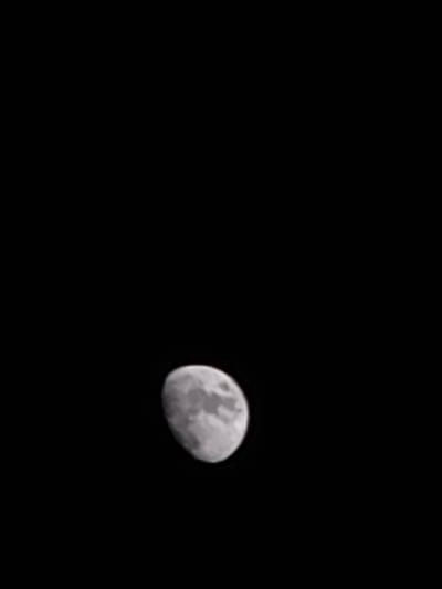 The image depicts a waxing gibbous moon against a black background. There are no indications of the location being Пловдив, Bulgaria, or any other city.
