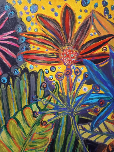 This is an abstract painting featuring vibrant, bold brushstrokes and colors. Dominant elements include large, stylized flowers with petals in shades of red, orange, yellow, and black. Several smaller, circular shapes in blue and purple are scattered across the yellow background, resembling bubbles or scattered light. In the foreground, there are stylized plant-like forms with elongated, spiky structures in blues and greens, as well as broad, green leaves with yellow and orange accents. The overall composition suggests a lively, perhaps tropical or fantastical botanical scene rendered in a highly expressive and non-representational style. The painting does not depict any specific identifiable location, therefore it cannot be associated with a location in the city of Чэрвеньскі сельскі Савет, Belarus.