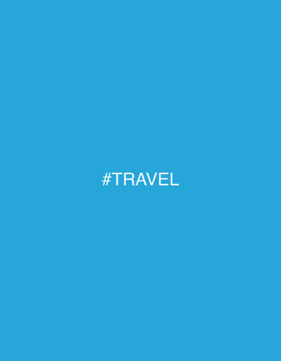 The image is a simple, minimalist graphic with a solid bright blue background. Centered on the image, in white, sans-serif text, are the words "#TRAVEL". There is no discernible location in Wewala, Sri Lanka, or any people, subjects, objects, actions, or interactions. The scene is purely textual on a plain colored background.