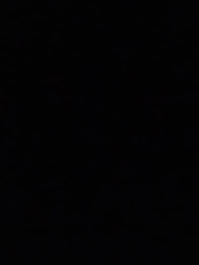 The image is completely black, offering no visual information to describe. Therefore, it is impossible to provide details about the location in Orzhiv, Ukraine, or any people, subjects, objects, actions, interactions, or the environment.