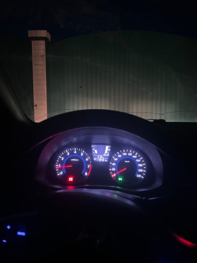 The image depicts the illuminated dashboard of a car at night. The speedometer shows a speed of approximately 20 km/h. The tachometer indicates approximately 1,500 rpm. The odometer displays 17,949 km. The location is not specified by the data and it is not apparent in the image.