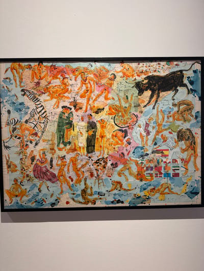 This is a framed artwork, likely a painting or mixed media piece, displayed on a white wall. The artwork is densely populated with various figures and elements, appearing to be set against a backdrop of a map, given the lines, grids, and geographical markings visible beneath the painted layers.
The subjects include numerous human figures, depicted in various dynamic poses, many rendered in shades of orange and brown. These figures are interspersed with other elements such as a large black bull, a zebra, a creature with large, reddish-brown wings, and what appears to be a tank or military vehicle in green. There are also several small flags scattered across the upper right portion of the artwork.
The overall impression is one of chaotic movement and perhaps struggle or exertion, with figures contorted and interacting with each other and the surrounding elements. The scene lacks a clear narrative, instead presenting a collage of disparate forms and imagery.
Notable details include the use of watercolor or ink washes, giving some areas a fluid and translucent quality, while other areas have more defined lines. The map beneath suggests a geographical context, and the presence of flags could allude to national or political themes. The artwork does not convey a specific time of day or weather conditions, and the emotions evoked are open to interpretation, but the active poses suggest energy and intensity.
Visible text includes fragmented geographical labels on the underlying map, such as "ADMINISTRACION TERRITORIAL" and "DE ESPAÑA". There are also some indecipherable handwritten annotations and possibly labels on the flags.