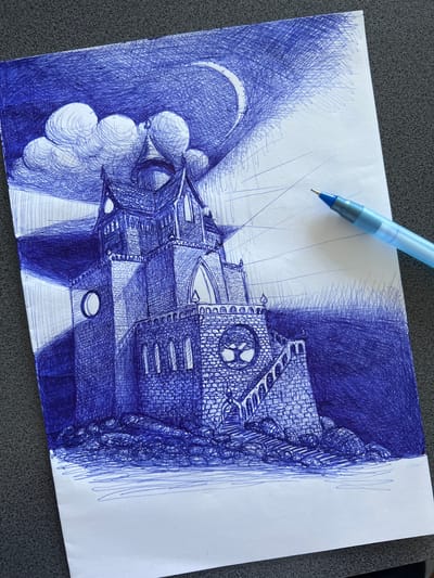 The image shows a pen and ink drawing of a large, imposing castle or cathedral-like structure on a rocky terrain. The drawing is done in blue ink on white paper. The structure has multiple towers, arched windows, and detailed stonework. A crescent moon and clouds are depicted in the night sky above. A pen with a light blue barrel and a silver tip rests on the right side of the drawing. The drawing style is characterized by extensive cross-hatching and stippling to create shading and texture. The style evokes a Gothic or fantasy aesthetic. There are no people or animals depicted in the drawing. The overall scene suggests a mysterious or ancient setting. This drawing does not depict any location in the city of Rezina, Moldova.