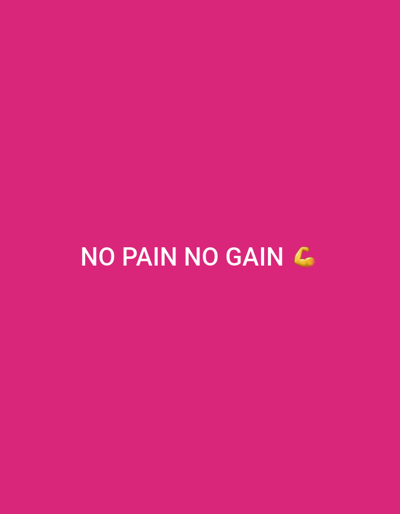 The image displays a digital graphic with a solid, vibrant pink background. Centered horizontally and vertically in white capital letters, the phrase "NO PAIN NO GAIN" is visible. Immediately to the right of the word "GAIN," a yellow emoji depicting a flexed bicep is present. The scene does not depict a physical location within the city of Saoula, Algeria, or any other real-world environment; it is a two-dimensional typographic design. No people, subjects, actions, or interactions are present beyond the text and emoji.