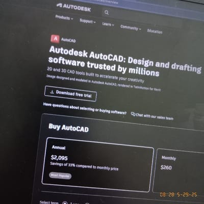 The image is a screenshot of a webpage for the Autodesk AutoCAD software. The webpage is black with white text. The top of the page reads "Autodesk AutoCAD: Design and drafting software trusted by millions." There is a button that says "Download free trial" below this text. The next section is "Have questions about selecting or buying software?". Below this is "Buy AutoCAD" in larger, bolded white text. The section "Buy AutoCAD" has two boxes, one for "Annual" and one for "Monthly". The annual cost is $2,095. The text below this reads "Savings of 33% compared to monthly price." The "Annual" box also has a button that says "Most Popular". The "Monthly" box says $260. The bottom of the page says "Select term" with the date "08-28-5-29-25" in the bottom right corner. The coordinates (-6.276, 106.551) are located in the city of Kecamatan Panongan, Indonesia.
