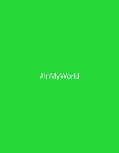 A solid green background fills the frame. Centered horizontally and vertically is the hashtag "#InMyWorld" in a simple, sans-serif font. The text is white, offering a stark contrast against the vibrant green backdrop. The overall image is simple and minimalist, drawing attention to the hashtag as the focal point.