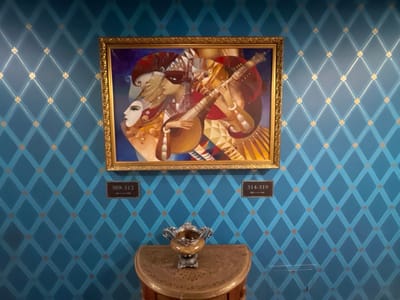A framed painting hangs on a patterned blue wall. The artwork depicts a musician and people wearing masks. Below the painting are signs indicating room numbers: "309-312" on the left and "314-319" on the right, each with an arrow pointing to the respective rooms. A small, ornate table with a decorative vase sits below the signs. The wall is adorned with a diamond pattern and golden accents.