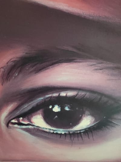 This is a close-up, stylized painting of a human eye. The subject is a single eye, viewed from the side, with the eyelid, eyebrow, and surrounding skin rendered in shades of purple, pink, and white. The iris is dark, reflecting bright highlights that suggest light sources. Eyelashes are visible along the upper and lower eyelids. The background is an abstract blend of colors, with a dominant purple-brown hue. The painting appears to be a work of art, possibly an oil or acrylic painting, with visible brushstrokes and textures. There is no discernible text in the image. The lighting is dramatic, emphasizing the contours of the eye. The emotion conveyed is subtle, perhaps contemplative or intense due to the focused gaze and prominent highlights. The context of Soisy-sous-Montmorency, France, provides a geographical setting but no direct visual cues are present in the image itself to connect it to that location.