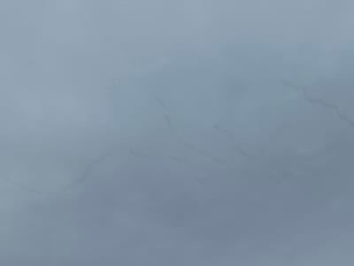 The image shows a grey, slightly textured surface, possibly a wall or ceiling. There are subtle, faded lines or streaks across the surface, suggesting water stains or imperfections in the material. The location in Rutherglen, United Kingdom, and any information about people, subjects, objects, actions, interactions, or the environment are not discernable from the provided image.