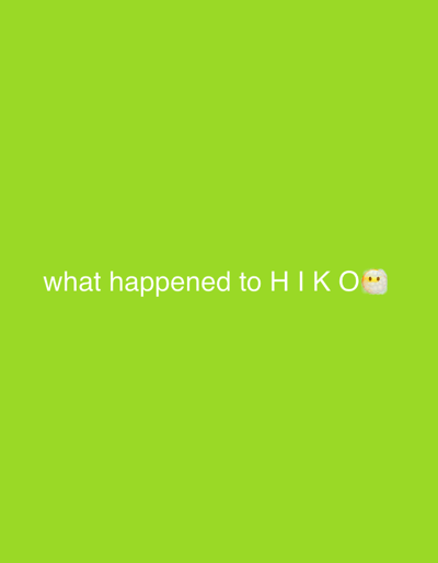 The image is a solid green field with the text "what happened to HIKO" in white, and a small, round, yellowish, and white object with black eyes and two dots below, possibly resembling an emoji, at the end of the text. No location details are discernible from the image.