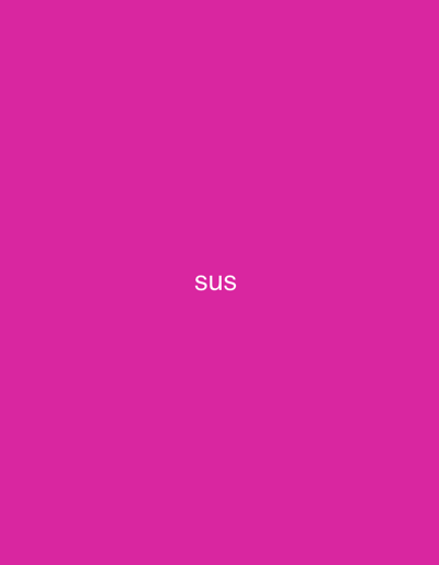 The image displays the word "sus" in white text centered on a bright pink background. The text is positioned roughly in the lower center of the frame. There are no discernible people, subjects, objects, actions, or interactions. The environment is solely the pink background. The location in the city of Safari, Nigeria, cannot be determined from this image.