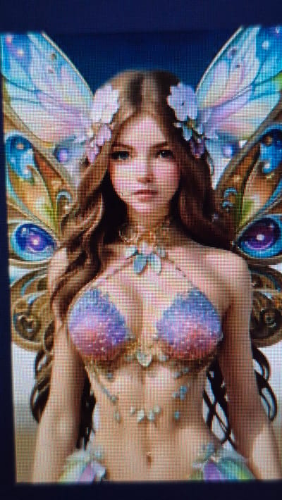 This is a close-up, digital illustration of a fantasy character, likely a fairy or nymph. The subject has long, wavy brown hair adorned with light purple flowers. She has large, expressive blue eyes and fair skin. She is wearing an elaborate, iridescent bikini top that shimmers with pinks, purples, and blues, and a matching ornate jewelry piece around her neck and chest, featuring light blue, tear-drop shaped gems. Large, elaborate butterfly-like wings extend from her back, featuring intricate patterns in shades of blue, green, yellow, and purple, with eye-like designs. The background is a dark, blurred blue. There is no discernible urban or natural environment, and thus no connection to Цярэніцкі сельскі Савет, Belarus. The image is a rendered artwork, not a photograph of a real-world scene.