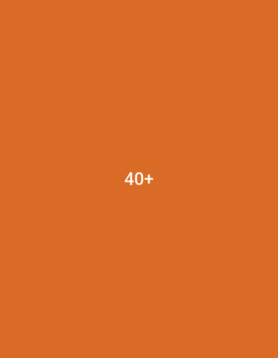 The image is a plain, orange background with the text "40+" in white, centered in the middle of the frame. There are no people, subjects, objects, or actions visible. The environment is not specified and there is no indication of its location in Lensedly, Czechia.