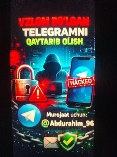 This is a digital advertisement or poster, depicted as situated in Gulbahor, Uzbekistan. The image features a dark, technologically themed background with glowing red and blue highlights, digital data streams, and a red skull and crossbones graphic on the left.
The primary text at the top is in Uzbek: "VZLON BO'LGAN TELEGRAMNI QAYTARIB OLISH," displayed in red, white, and green capital letters. This translates to "Recovery of Hacked Telegram."
The central imagery includes a hooded figure, silhouetted against a blue glow, positioned behind a laptop displaying a red warning symbol on its screen. To the left of this figure, an open metallic padlock is visible, alongside a red triangular warning sign with a white exclamation mark. To the right of the figure, a dark smartphone is shown upright, its screen displaying the blue Telegram application logo. A red banner with the word "HACKED" in white capital letters is diagonally overlaid across the phone's screen.
At the bottom of the advertisement, white text in Uzbek reads "Murojaat uchun: @Abdurahim_96," indicating "For inquiries: @Abdurahim_96." Below this text, a blue circular icon with the white Telegram paper airplane logo is present. The lower portion of the image also displays a metallic chain running horizontally, with a white envelope icon and a green shield icon containing a white checkmark placed upon it.