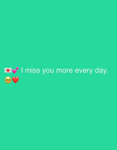 The image is a digitally created graphic with a solid teal background. In the bottom left quadrant, there are three emojis: a white envelope with a red heart, two pink hearts, and a sad face with teary eyes next to a red heart. To the right of the emojis, white text reads "I miss you more every day." There is no discernible location in Tbilisi, Georgia.