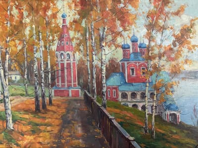 This oil painting depicts an autumn scene with religious architecture in Tutaev, Russia. In the foreground, a wet path leads uphill, bordered by a dark wooden fence with rounded posts. The path is covered with fallen golden-orange leaves. Tall, slender birch trees with white and black bark line the path.

To the left of the path stands a tall, red bell tower with white trim, topped with a blue dome and cross. Adjacent to the bell tower, a red building with a blue roof features arched windows and white decorative elements. To the right of the path, nestled on a grassy hill, is a smaller red building with multiple blue domes and crosses. The architecture suggests a religious complex, likely a monastery or church. The background consists of a body of water, possibly a river, and a pale, overcast sky. The overall impression is one of serene beauty in the colors of autumn.