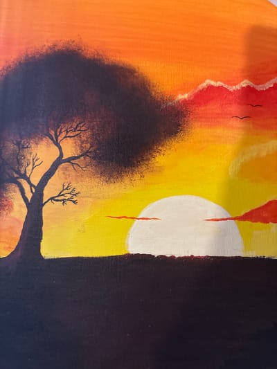 The media file is a painting of a surreal landscape. The scene features a large, dark, silhouetted tree in the foreground with bare branches reaching upwards. Behind the tree, a bright yellow sky dominates the scene, with a large, white orb that appears to be the sun or moon. Streaks of orange and red paint create a sunset or sunrise effect. Two thin, vertical red lines descend from the top of the image, resembling dripping paint. To the far right, a solid, dark vertical shape occupies a significant portion of the frame, possibly representing a building or a cliff face. The overall mood of the painting is dramatic and somewhat ominous due to the dark silhouettes and the intense colors. The time of day appears to be either dawn or dusk. There are no visible people or text in the painting.