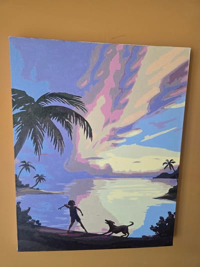 This is a painting on canvas depicting a dramatic scene with a surreal, dreamlike sky. The sky is rendered in broad strokes of pastel colors, including lavender, pink, pale yellow, and light blue, suggesting a twilight or sunrise/sunset. The overall effect is ethereal and somewhat abstract.

In the foreground, a large, dark silhouette of a palm frond dominates the left side of the canvas, its sharp leaves reaching towards the sky. Scattered in the background are smaller silhouettes of palm trees.

The right side of the painting features dark, jagged cliff faces or rock formations. Against these dark elements, two silhouetted figures are visible. One figure, appearing to be a person, is depicted in a dynamic pose, as if falling or leaping from the cliff. Their body is angled, with arms and legs outstretched. Above and slightly to the left of this figure, a smaller, quadrupedal silhouette, possibly a dog, is shown in a similar leaping or climbing motion on the cliff face. A lone, small palm tree silhouette is perched precariously on the edge of the cliff.

The combination of the stylized sky, silhouetted figures, and tropical foliage creates a sense of adventure, mystery, or perhaps even peril. The time of day is ambiguous due to the stylized colors of the sky, but the dramatic poses of the figures suggest an action-packed moment. The location cues of palm trees and cliffs hint at a tropical or exotic environment. There is no visible text in the image.