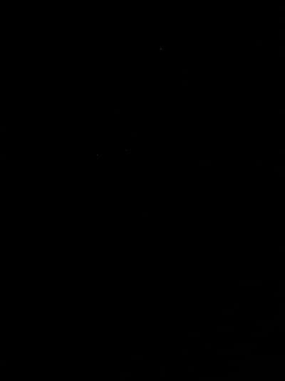 The image provided is entirely black and does not contain any visual information to describe. Therefore, I cannot provide details about the location in the city of Akydra, Abkhazia, nor any description of people, subjects, objects, actions, interactions, or the environment.