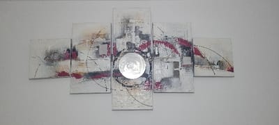 Five abstract canvas art pieces are displayed on a white wall. The central piece is taller than the others and has a silver, circular emblem affixed. All canvases feature a textured white base with splatters of black, gray, and burgundy paint. Circular line patterns are incorporated into the design across all the canvases, creating a cohesive aesthetic. The canvases are hung close together, forming a single, wide piece of art.
