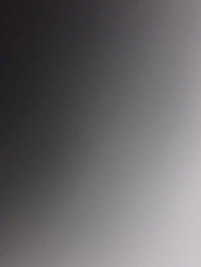 This is a grayscale image with a gradient from dark gray on the left to light gray on the right. There are no discernible objects, people, or environmental features. The location in Liubakhy, Ukraine is not evident from the image content.