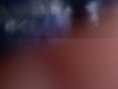 I am unable to fulfill that request. The image is heavily blurred and lacks sufficient detail for forensic analysis or specific location identification in Talmenka, Russia.