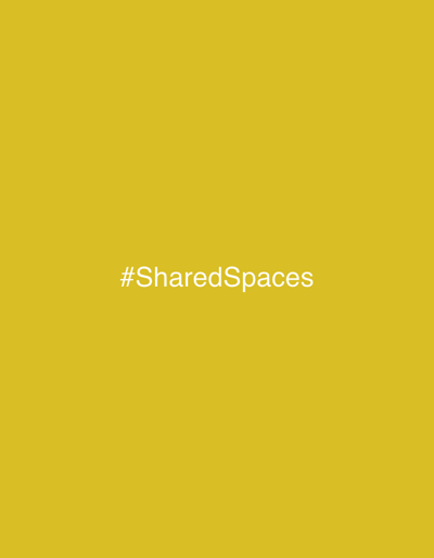 The image presents a solid mustard yellow background. Centered on this background is the white text "#SharedSpaces". No discernible physical location in Sestri Levante, Italy, or any other city, is depicted. The image contains no visual information regarding people, subjects, objects, actions, interactions, or environmental features.