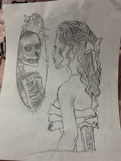 A pencil sketch on a white sheet of paper depicts a young woman in profile, looking into a mirror that reflects a skeleton. The woman has curly hair tied back with a bow and is wearing a ruffled dress and a corset. The skeleton in the mirror is detailed, showing a skull and ribcage, with vines and small skulls surrounding it. The background is a textured pink fabric, possibly a blanket. The sketch is incomplete, with some areas more rendered than others. The scene appears to be set indoors, on a flat surface. There is no identifiable location in the city of Gaylord, United States of America.