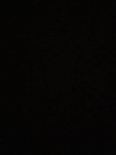 The image is completely black, with no discernible content, objects, people, or text visible. It appears to be a blank or underexposed shot, lacking any visual information.