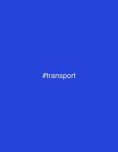 The image displays a solid, uniform blue background. Centered horizontally and vertically within this blue field is the white text "#transport" in a sans-serif typeface. No other discernible subjects, objects, people, actions, interactions, or environmental details are present. The image does not provide any visual information to identify a specific location within Tremblay-en-France, France, or any other geographical area.